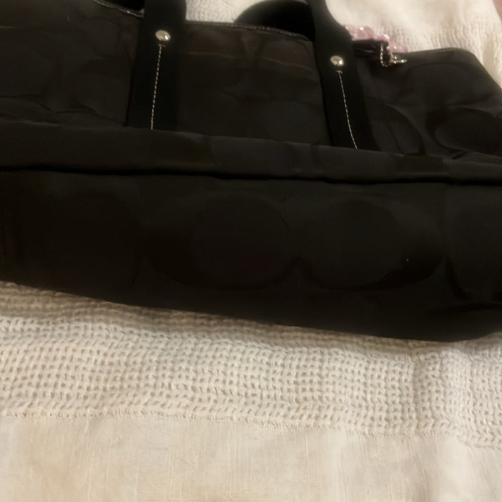 Pre-loved Black Coach Tote bag, Pink Flower Accent, & Blk hang tag. “CALL OUTS”. - Picture 3 of 10